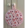 Manique ronde fleur rose